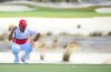 Gary Woodland studies his putt at the third green during the final round of the Hero World Challenge at Albany Golf Club in Nassau, Bahamas, Saturday, Dec. 7, 2019. (AP Photo/Dante Carrer)