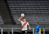 Rafael Borre of Argentina's River Plate celebrates a goal scored by Milton Casco against Peru's Binacional during a Copa Libertadores Group D soccer match at the Antonio Vespucio Liberti stadium in Buenos Aires, Argentina, Wednesday, March 11, 2020. The game was played in an empty, closed door stadium, as punishment for the violent incidents that happened during the 2018 Libertadores final against town rivals Boca Juniors. (AP Photo/Gustavo Garello)