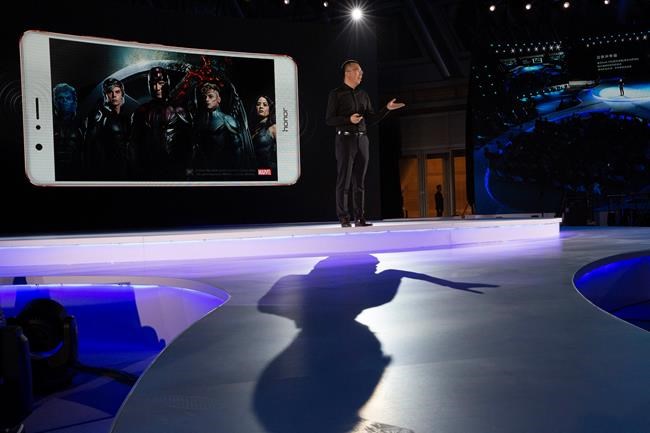 George Zhao, Huawei's Honor brand president speaks during an event to launch one of its mobile phone in Beijing, China, Tuesday, May 10, 2016. In an announcement Tuesday, Nov. 17, 2020, Chinese tech giant Huawei says it is selling its budget-price Honor smartphone brand in an effort to rescue the struggling business from damaging U.S. sanctions imposed on its parent company. (AP Photo/Ng Han Guan)