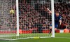 Chelsea's Jorginho celebrates scoring his side's first goal during the English Premier League soccer match between Arsenal and Chelsea, at the Emirates Stadium in London, Sunday, Dec. 29, 2019. (AP Photo/Ian Walton)