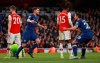 Chelsea's Jorginho, left, celebrates with his teammate Cesar Azpilicueta after scoring his side's first goal during the English Premier League soccer match between Arsenal and Chelsea, at the Emirates Stadium in London, Sunday, Dec. 29, 2019. (AP Photo/Ian Walton)