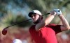 Belgium's Thomas Pieters follows his ball on the 18th tee during first round one of the Abu Dhabi Championship golf tournament in Abu Dhabi, United Arab Emirates, Thursday, Jan. 16, 2020. (AP Photo/Kamran Jebreili)