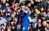 Chelsea's Olivier Giroud celebrates after scoring a goal against Tottenham Hotspur's Jan Vertonghen during the English Premier League soccer match between Chelsea and Tottenham Hotspur in London, England, Saturday, Feb. 22, 2020. (AP Photo/Kirsty Wigglesworth)