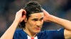 FILE - In this Feb. 29, 2020 file photo, PSG's Edinson Cavani adjust his headband during the French League One soccer match between Paris-Saint-Germain and Dijon, at the Parc des Princes stadium in Paris, France. Paris Saint-Germain‚Äôs record scorer needs to find another club next season after PSG‚Äôs Sporting Director Leonardo said he won‚Äôt get a new contract when his current deals expire at the end of June, adding that it was a particularly tough not to give a new contract to Cavani, who is both very popular with fans. (AP Photo/Michel Euler, File)