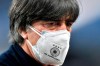 Germany head coach Joachim Low stands on the pitch prior to the start of the World Cup 2022 group J qualifying soccer match between Germany and North Macedonia in Duisburg, Germany, Wednesday, March 31, 2021. (AP Photo/Martin Meissner)