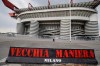 A banner in the colours of AC Milan and reading in Italian 