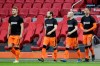 Netherlands' players enters on the field with shirt reading ' football support change' prior to the start of the World Cup 2022 group G qualifying soccer match between The Netherlands and Latvia at the Johan Cruyff ArenA in Amsterdam, Netherlands, Saturday, March 27, 2021. (AP Photo/Peter Dejong)