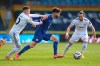 Chelsea's Christian Pulisic, right, challenges for the ball with Leeds United's Ezgjan Alioski during the English Premier League soccer match between Leeds United and Chelsea at Elland Road stadium, in Leeds, England, Saturday, March 13, 2021.(Laurence Griffiths/Pool via AP)