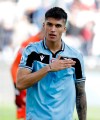 Lazio's Joaquin Correa celebrates after scoring his side's second goal during an Italian Serie A Soccer match between Lazio and Bologna at Rome's Olympic stadium, Saturday, Feb. 29, 2020. (AP Photo/Andrew Medichini)
