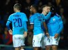 Manchester City's Raheem Sterling, second from left, celebrates with his teammates Bernardo Silva, Phil Foden and Gabriel Jesus, right, after scoring his side's third goal during the English League Cup quarter final soccer match between Oxford United and Manchester City at Kassam stadium, in Oxford, England, Wednesday, Dec. 18, 2019. (AP Photo/Leila Coker)