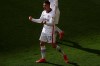 Frankfurt's Andre Silva celebrates with teammates after scoring during the German Bundesliga soccer match between Borussia Dortmund and Eintracht Frankfurt in Dortmund, Germany, Saturday, April 3, 2021. (Lars Baron/Pool via AP)