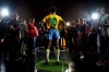 Journalists stand around the statue of legendary Brazilian player Pele at the Brazilian Soccer Team Museum in Rio de Janeiro, Brazil, Thursday, Feb. 20, 2020. The Brazilian Football Confederation unveiled the statue as part of commemorations of 50 years since the World Cup victory in 1970. (AP Photo/Leo Correa)