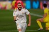 Real Madrid's Karim Benzema celebrates after scoring during the Spanish La Liga soccer match between Real Madrid and Villareal at the Alfredo di Stefano stadium in Madrid, Spain, Thursday, July 16, 2020. (AP Photo/Bernat Armangue)
