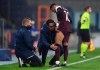 PSG's team medics attend to Neymar, after he was injured, during the Champions League group H soccer match between Basaksehir and Paris Saint Germain in Istanbul, Wednesday, Oct. 28, 2020. (Ozan Kose/Pool via AP)