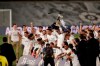 Real Madrid's players lift the cup as they celebrate winning the Spanish La Liga 2019-2020 following a soccer match between Real Madrid and Villareal at the Alfredo di Stefano stadium in Madrid, Spain, Thursday, July 16, 2020. (AP Photo/Bernat Armangue)