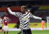 Manchester United's Paul Pogba celebrates after scoring during the English Premier League soccer match between Burnley and Manchester United in Burnley, England, Tuesday, Jan. 12, 2021. Manchester won the match 1-0.(Clive Brunskill/Pool via AP)