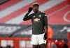 Manchester United's Paul Pogba during the English Premier League soccer match between Sheffield United and Manchester United at the Bramall Lane stadium in Sheffield, England, Thursday, Dec. 17, 2020. Manchester United won the match 3-2.(AP Photo/Rui Vieira, Pool)