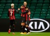 AC Milan's Brahim Diaz, right, celebrates with teammates Zlatan Ibrahimovic, center and Samu Castillejo, left, after scoring his team's second goal during the Europa League Group H first leg soccer match between Celtic and AC Milan at the Celtic Park stadium in Glasgow, Scotland, Thursday, Oct. 22, 2020. (Jane Barlow/Pool via AP)