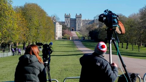 Media wait ahead of the funeral of Britain's Prince Philip in Windsor, England Saturday April 17, 2021. Philip died April 9 at the age of 99 after 73 years of marriage to Britain's Queen Elizabeth II. Coronavirus restrictions mean there will be only 30 mourners for the service, including the widowed queen, her four children and her eight grandchildren. (Frank Augstein)