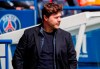 PSG's head coach Mauricio Pochettino watches play during the French League One soccer match between Paris Saint-Germain and St Etienne at Parc Des Princes in Paris, France, Sunday, April 18, 2021. (AP Photo/Francois Mori)