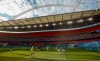Manchester City players warm up ahead of the FA Cup semifinal soccer match between Arsenal and Manchester City at Wembley in London, England, Saturday, July 18, 2020. (AP Photo/Matt Childs,Pool)