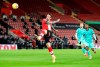 Southampton's Danny Ings scores his team's first goal during the English Premier League soccer match between Southampton and Liverpool at St Mary's Stadium, Southampton, England, Monday, Jan. 4, 2021. (AP Photo/Noami Baker,Pool)