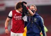 Arsenal's David Luiz holds a towel on a cut to his head following a clash with Wolverhampton Wanderers' Raul Jimenez during the English Premier League soccer match between Arsenal and Wolverhampton Wanderers at Emirates Stadium, London, Sunday, Nov. 29, 2020. (John Walton/Pool via AP)