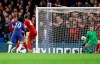 Chelsea's Willian, second left, kicks the ball to score has team's first goal during the English FA Cup fifth round soccer match between Chelsea and Liverpool at Stamford Bridge stadium in London Wednesday, March 4, 2020. (AP Photo/Kirsty Wigglesworth)