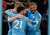 Manchester City's Kevin De Bruyne, left, is congratulated by teammates after scoring his team's second goal during the English Premier League soccer match between Manchester City and West Ham at Etihad stadium in Manchester, England, Wednesday, Feb. 19, 2020. (AP Photo/Rui Vieira)