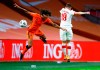 Poland's Daniel Szymanski, right, and Netherlands' Nathan Ake battle for the ball during the UEFA Nations League soccer match between the Netherlands and Poland in the Johan Cruyff ArenA in Amsterdam, Netherlands, Friday, Sept. 4, 2020. (AP Photo/Peter Dejong)