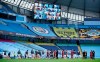 Liverpool players walk through a guard of honor from the Manchester City team ahead of their English Premier League soccer match between Manchester City and Liverpool at Etihad Stadium in Manchester, England, Thursday, July 2, 2020. (AP Photo/Dave Thompson,Pool)