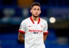 Sevilla's Lucas Ocampos reacts during the Champions League Group E soccer match between Chelsea and Sevilla at Stamford Bridge, London, England, Tuesday, Oct. 20, 2020. (AP Photo/Alastair Grant,Pool)