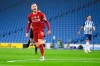 Liverpool's Jordan Henderson celebrates after scoring his team's second goal during the English Premier League soccer match between Brighton and Liverpool at Falmer Stadium in Brighton, England, Wednesday, July 8, 2020. (AP Photo/Daniel Leal Olivas,Pool)