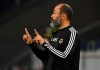 Wolverhampton Wanderers' head coach Nuno Espirito Santo gestures to his players during the Europa League quarterfinal match between Wolverhampton Wanderers and Sevilla at the MSV-Arena in Duisburg, Germany, Tuesday, Aug. 11, 2020. (Ina Fassbender/Pool Photo via AP)