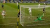 Leeds United's Stuart Dallas, left, scores his team's first goal during the English Premier League soccer match between Leeds United and Tottenham Hotspur at Elland Road in Leeds, England, Saturday, May 8, 2021. (AP Photo/Oli Scarff/Pool)