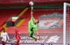 Arsenal's goalkeeper Bernd Leno makes a save during the English League Cup fourth round soccer match between Liverpool and Arsenal at Anfield, Liverpool, England, Thursday, Oct. 1, 2020. (Laurence Griffiths/Pool via AP)