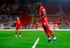 Liverpool's Sadio Mane celebrates after scoring his team's first goal during the English Premier League soccer match between Liverpool and Arsenal at Anfield in Liverpool, England, Monday, Sept. 28, 2020. (Jason Cairnduff/Pool via AP)