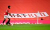 Manchester United's Marcus Rashford takes the ball up field during the English Premier League soccer match between Manchester United and Southampton at Old Trafford in Manchester, England, Monday, July 13, 2020. (AP Photo/Dave Thompson,Pool)