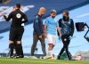 Manchester City's Sergio Aguero leaves the filed injured during the English Premier League soccer match between Manchester City and Burnley at Etihad Stadium, in Manchester, England, Monday, June 22, 2020. (AP Photo/Michael Regan,Pool)