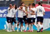 Manchester City's Sergio Aguero, centre, is congratulated by teammates after scoring his team's first goal during the English Premier League soccer match between Crystal Palace and Manchester City at Selhurst Park in London, England, Saturday, May 1, 2021. (AP Photo/Clive Rose/Pool)