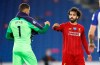 Liverpool's Mohamed Salah, right, gestures with Brighton's goalkeeper Mathew Ryan after the English Premier League soccer match between Brighton and Liverpool at Falmer Stadium in Brighton, England, Wednesday, July 8, 2020. (AP Photo/Paul Childs,Pool)