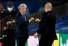 Crystal Palace's manager Roy Hodgson, left, congratulates Burnley's manager Sean Dyche following the English Premier League soccer match between Crystal Palace and Burnley at Selhurst Park, in London, England, Monday, June 29, 2020. Burnley defeated Crystal Palace 1-0. (AP Photo/Daniel Leal-Olivas,Pool)