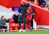 Liverpool's manager Jurgen Klopp embraces Sadio Mane as he leave the field during the English Premier League soccer match between Liverpool and Arsenal at Anfield in Liverpool, England, Monday, Sept. 28, 2020. (Laurence Griffiths/Pool via AP)