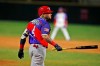 Puerto Rico's Yadier Molina walk to first base after hit by pitch during the first inning of the team's' Caribbean Series baseball final game against the Dominican Republic at Teodoro Mariscal stadium in Mazatlan, Mexico, Saturday, Feb. 6, 2021. (AP Photo/Moises Castillo)