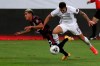 Mexico's Uriel Antuna, left, and United States' Aaron Herrera fight for the ball during a Concacaf Men's Olympic Qualifying championship soccer match in Guadalajara, Mexico, Wednesday, March 24, 2021. (AP Photo/Fernando Llano)