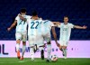 Argentina's Nicolas Gonzalez, left, celebrates scoring his side's first goal against Paraguay with teammates during a qualifying soccer match for the FIFA World Cup Qatar 2022 in Buenos Aires, Argentina, Thursday, Nov. 12, 2020.(Marcelo Endelli, Pool via AP)