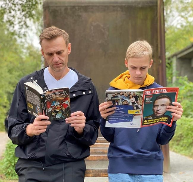 In this photo published by Russian opposition leader Alexei Navalny on his Instagram account on Saturday, Oct. 3, 2020, Alexei Navalny, left, holds