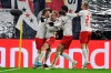 Leipzig's Emil Forsberg, second from left, celebrates with teammates after scoring his side's second goal during the Champions League group G soccer match between RB Leipzig and Benfica in Leipzig, Germany, Wednesday, Nov. 27, 2019. (AP Photo/Jens Meyer)