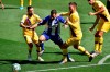 Alaves' Edgar Mendez, center, fights for the ball with Barcelona's Jordi Alba, left, and Clement Lenglet during the Spanish La Liga soccer match between Alaves and FC Barcelona, at Mendizorroza stadium, in Vitoria, northern Spain, Sunday, July 19, 2020. (AP Photo/Alvaro Barrientos)