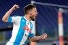 Napoli's Dries Mertens celebrates after scores against Roma during the Italian Serie A soccer match between Roma and Napoli at Rome's Olympic stadium, Sunday, March 21, 2021. (AP Photo/Gregorio Borgia)